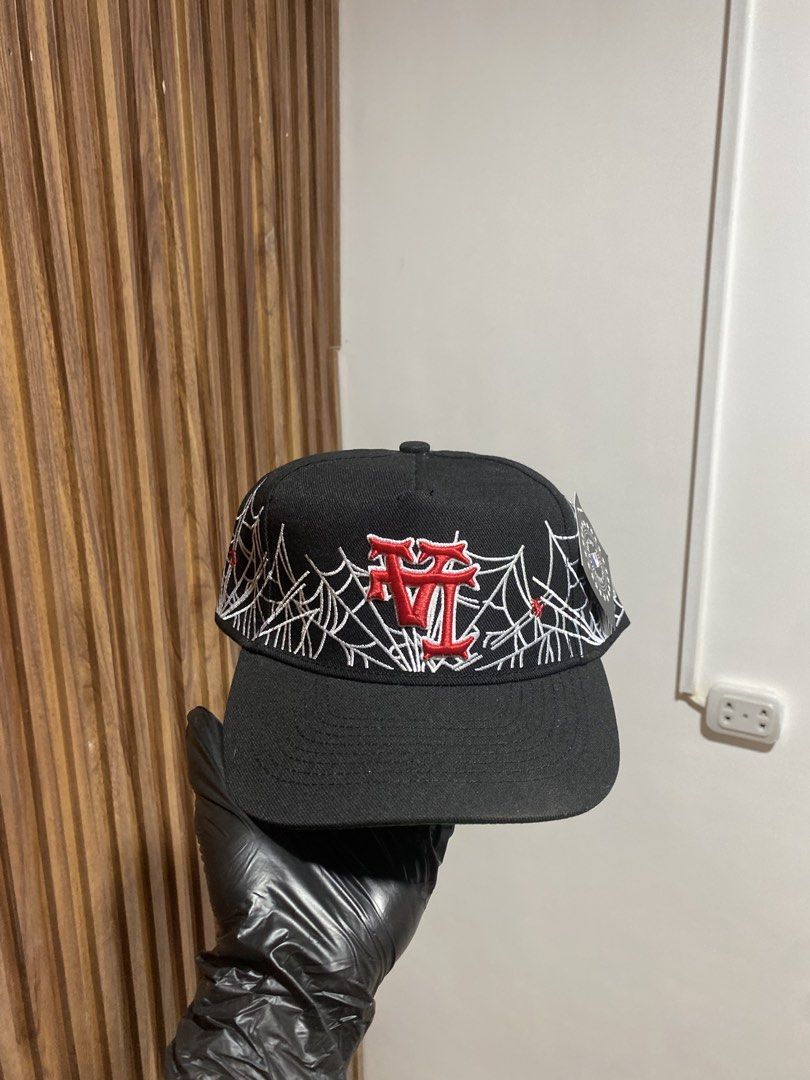 Kill The Hype Los Angeles KTH Spiderweb Snapback Hat (Category: Caps & Hats) located in Caloocan City. Submitted by heatedcaps4425 (Listing ID 1467802231, Image 2). Description: - Brand: Kill The Hype Los Angeles (KTH) - Style: Black snapback hat with adjustable plastic closure - Details: Detailed white spiderweb embroidery, red gothic KTH logo on front, and white text on the back - Interior: Branded KTH-LA.COM taping and tag - Condition: Brand n
