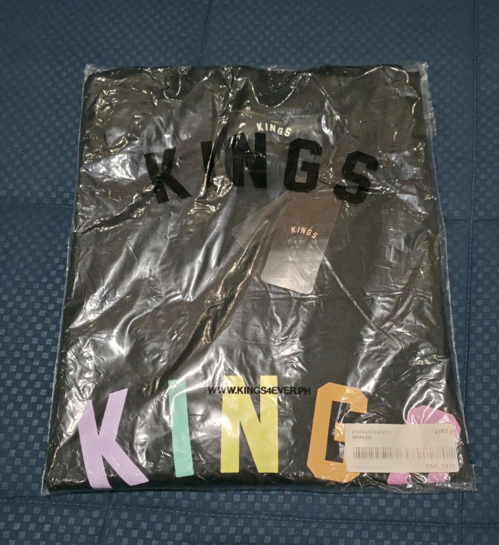 Kings Forever S os 22x28 (Category: Tshirts & Polo Shirts ) located in Santa Rosa. Submitted by rowhell09 (Listing ID 1467664240, Image 3). Description: Kings Forever Brandnew Small os 💸1000, 22x28 MOD. LBC MOP. BDO, GCASH LOC. NUEVA ECIJA Meet up. Santa rosa Nueva Ecija - Style: Heavy t-shirt with oversized fit and crew neckline - Color: Black with multicolored pastel front and back lettering - Size: XS (22" chest width, 28" length) - Condition