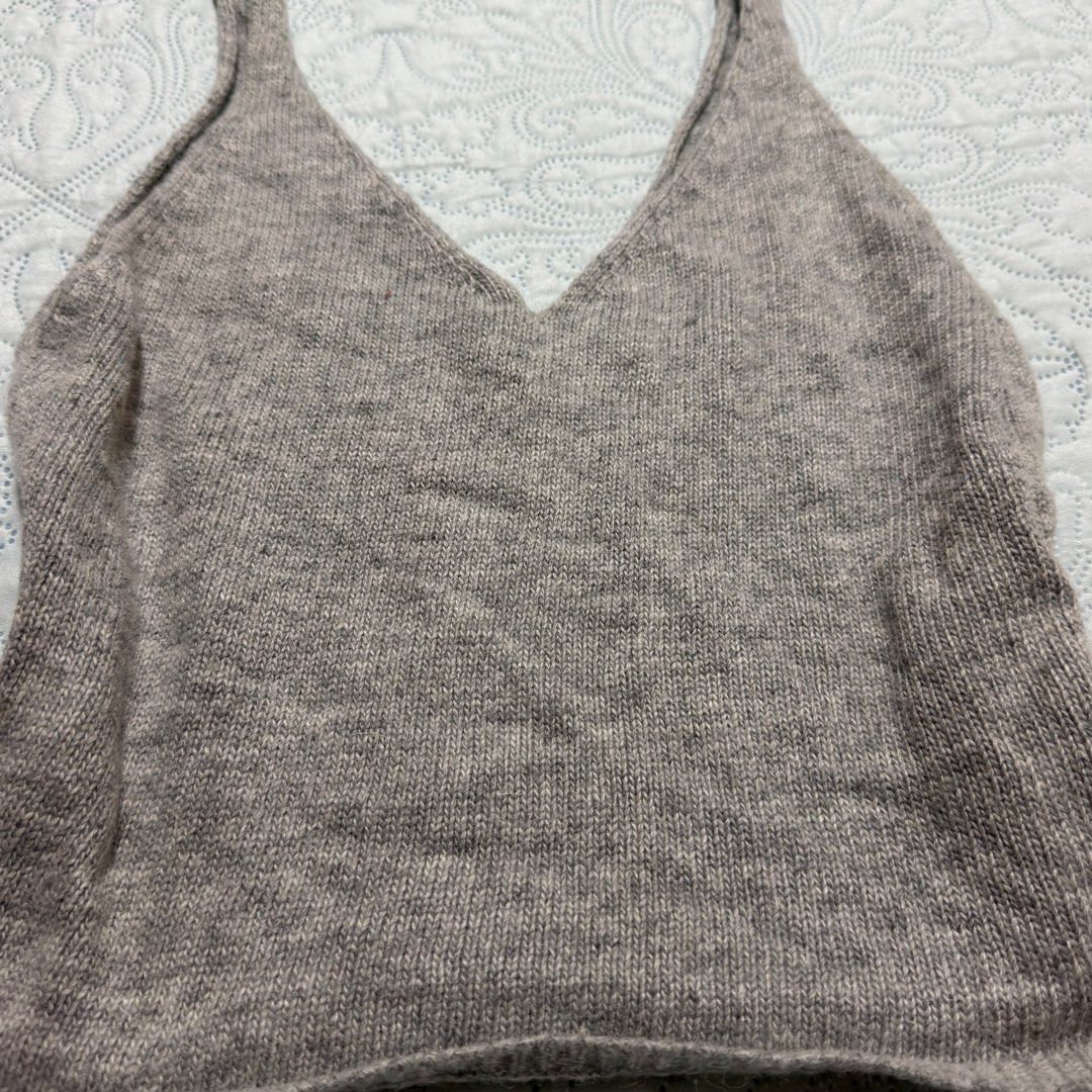 Knitted Vneck Tank (Category: Sleeveless) located in Cebu City. Submitted by shopjillscloset (Listing ID 1467753924, Image 2). Description: - no flaws - stretchy - can fit s to m.