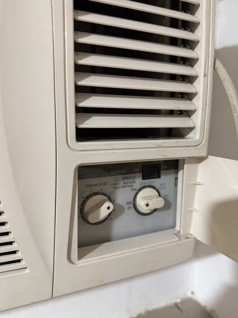 Kolin Window Type Air Conditioner Manual Controls (Category: Air Conditioning and Heating) located in Manila. Submitted by mdncy (Listing ID 1467787375, Image 2). Description: - Brand: Kolin window type air conditioner - Color: Off-white finish - Controls: Standard manual knobs for thermostat and fan speed - Features: Air swing function and restart delay protection - Condition: Cooling unit works perfectly, with standard cosmetic wear from usage 