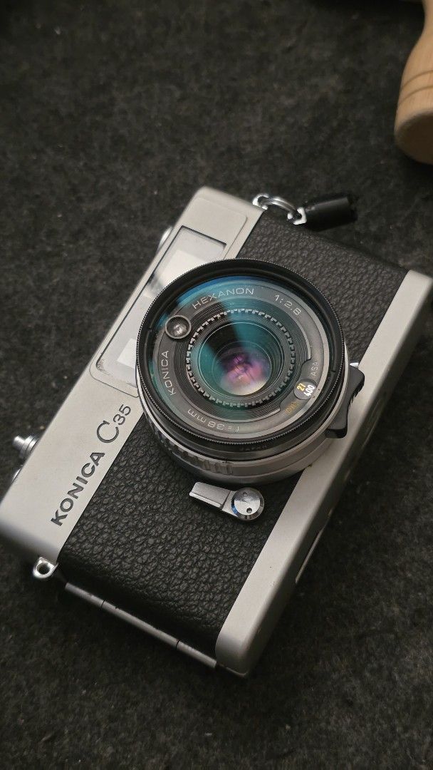 Konica C35 35mm Rangefinder Film Camera (Category: Cameras) located in Manila. Submitted by ashleyjust52538 (Listing ID 1467795215, Image 1). Description: ​Bought this camera at a vintage camera shop in Vietnam. Ginamit ko lang nang isang beses during our trip. I can send you sample shots! ​RFS: Di ko na nagagamit and walang pambili ng film lol ​PM me if interested!.