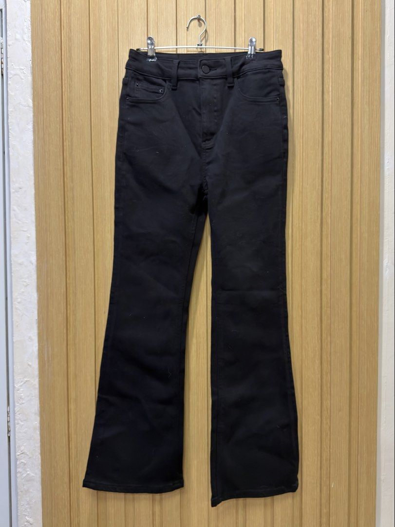 KS Denmo Black denim flare pants size 27 (Category: Jeans) located in Bacoor. Submitted by preloved_with_love_ (Listing ID 1467610271, Image 1). Description: - Color: Solid black - Size: 27 - Fit: High-rise with a flattering flare - Closure: Front button and zipper - Pockets: Classic five-pocket style with back patch pockets - Material: 75% viscose, 20% polyester, 3% viscose blend, 2% spandex (has stretch) - Condition: Clean dark wash finish.