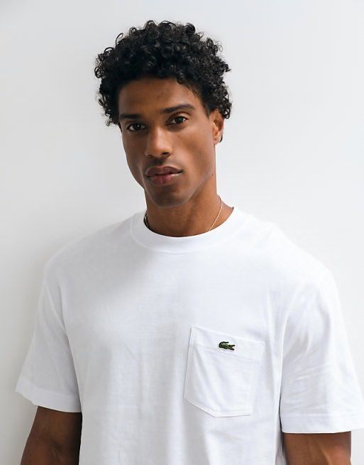 L4cost4 pocket mens shirt (Category: Tshirts & Polo Shirts ) located in Binan City. Submitted by chelsea05855 (Listing ID 1467666592, Image 3). Description: -Lacoste crew neck t-shirts with chest pocket and embroidered green crocodile logo. - Available in Size S,M,L,XL,XXL - original tags attached. (Mall pull out items) -Pick white or black color. -Clean styling, comfortable cotton material. -Great wardrobe staple for daily casual outfits. -Model