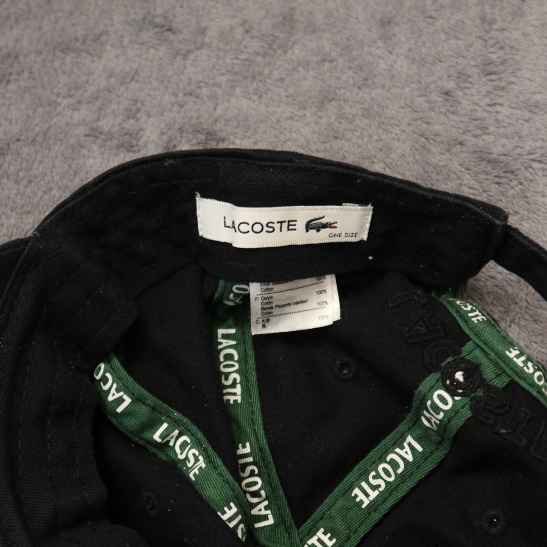 Lacoste Black Cap Baseball Hat One Size (Category: Caps & Hats) located in Manila. Submitted by gentlewind_62f064 (Listing ID 1467616854, Image 2). Description: - Authentic Lacoste classic black baseball cap - Features signature embroidered crocodile logo on the side - One size fits all with an adjustable back strap - Includes branded green taping along the inner seams - Perfect everyday accessory for any casual outfit - Condition: Brand new / Ex