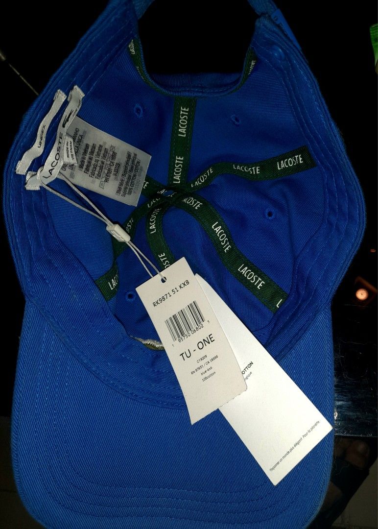 Lacoste Blue Cap With Big Croc Logo (Category: Caps & Hats) located in Taguig. Submitted by frenchquarter_010107 (Listing ID 1467806461, Image 3). Description: Lacoste Blue Cap With Big Croc Logo - Brand new with original tags attached (Model RK9871 51 KXB) - Eye-catching bright blue color with a big embroidered crocodile logo on the front - Made of 100% sustainable organic, twill cotton - Adjustable strap with a secure metal buckle at the back -
