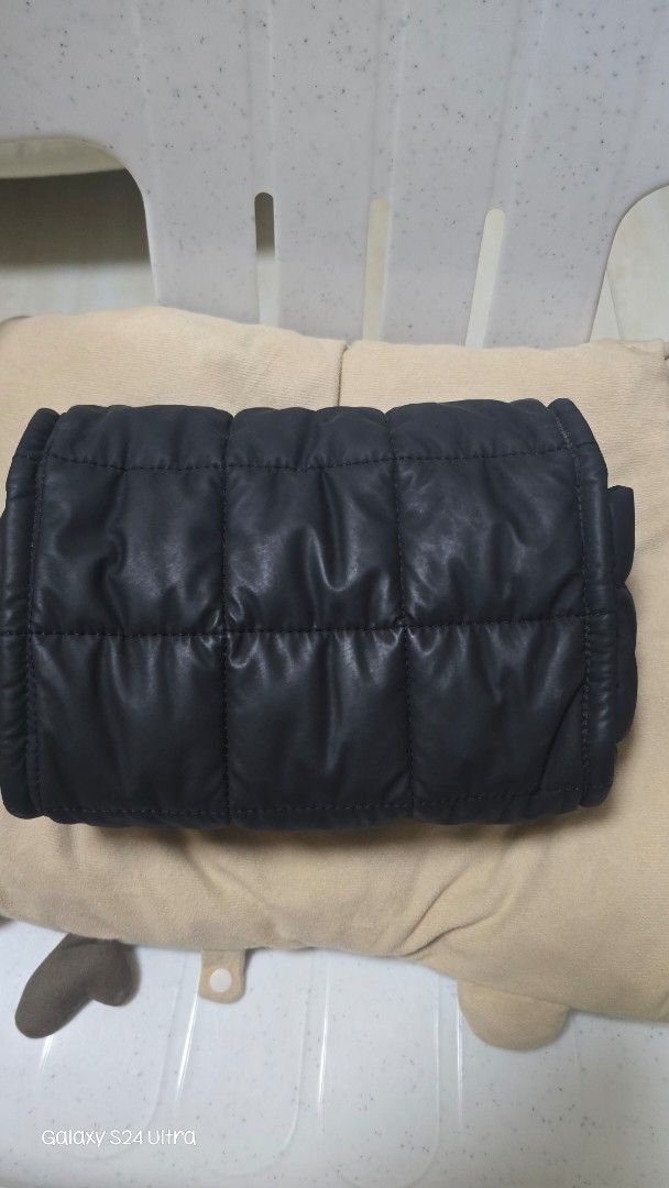 Lacoste Flap Crossover Bag Black NU4918YI (Category: Cross-body Bags) located in Navotas City. Submitted by lhynherrera (Listing ID 1467732179, Image 2). Description: Lacoste flap crossover bag in black colorway. Model NU4918YI. Made from 100% polyester coated with polyurethane. Puffer quilted design with magnetic snap closure and metal crocodile logo on the front. Brand new with tags attached, original retail tag showing ₱8,450.00..