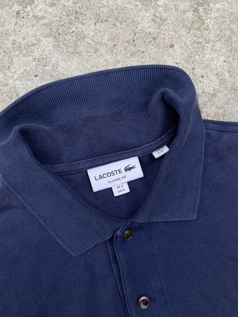 LACOSTE HEATHER BLUE POLO (Category: Tshirts & Polo Shirts ) located in Manila. Submitted by lunaras_declutter (Listing ID 1467718182, Image 2). Description: EXCELLENT CONDITION 9.5 COLOR RATE MEDIUM NO ISSUE.