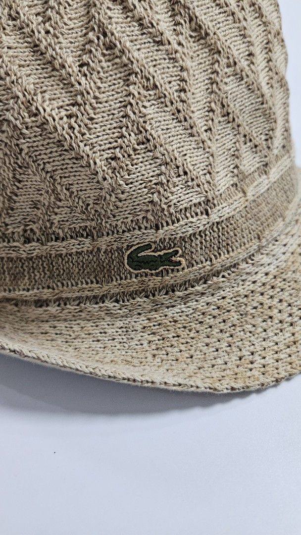 Lacoste Knit Bucket Hat Beige (Category: Hats & Beanies) located in Alfonso. Submitted by jbcamet (Listing ID 1467711499, Image 2). Description: - Brand: Lacoste - Color: Beige - Size: 58 cm - Origin: Made in Japan - Design: Intricate knit pattern throughout the crown with branded interior sweatband - Details: Classic embroidered green crocodile logo on the side - Condition: Brand new/Mint (ready to wear) - Mode of Payment: GCash, BPI, or Bank Tr