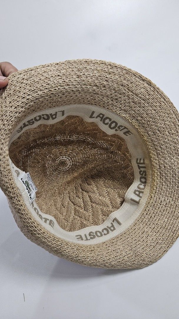 Lacoste Knit Bucket Hat Beige (Category: Hats & Beanies) located in Alfonso. Submitted by jbcamet (Listing ID 1467711499, Image 3). Description: - Brand: Lacoste - Color: Beige - Size: 58 cm - Origin: Made in Japan - Design: Intricate knit pattern throughout the crown with branded interior sweatband - Details: Classic embroidered green crocodile logo on the side - Condition: Brand new/Mint (ready to wear) - Mode of Payment: GCash, BPI, or Bank Tr