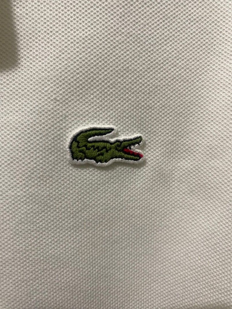 Lacoste Polo (Category: Tshirts & Polo Shirts ) located in Santo Tomas. Submitted by liyothrift (Listing ID 1467616579, Image 2). Description: For Sale 👕💯 Lacoste Polo White Width 19 Length 26 best fit meduim Excellent condition 💯👌 Location: Santo Tomas Davao Del norte PM 📩📩.