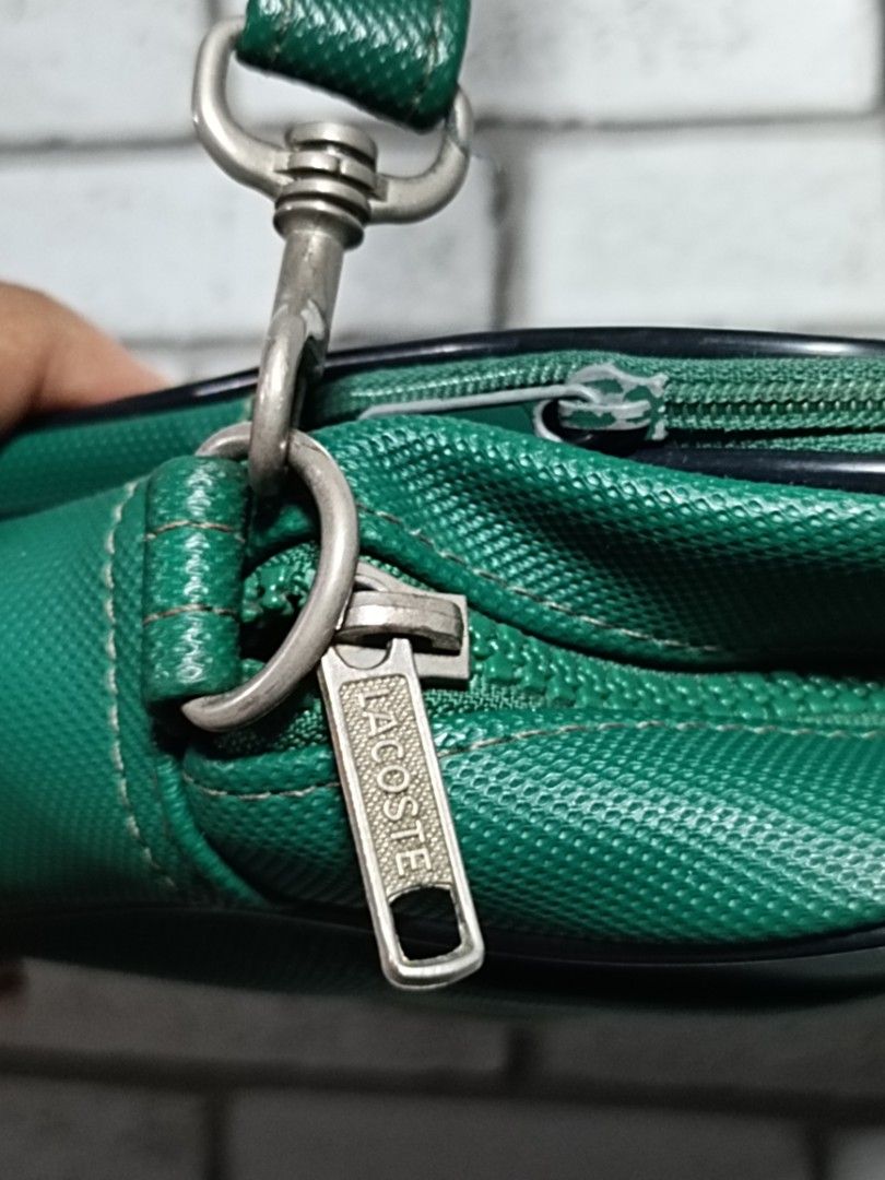 Lacoste Sling Bag (Category: Sling Bags) located in Cagayan de Oro. Submitted by rjr_thrift (Listing ID 1467722217, Image 3). Description: Vintage Lacoste crossbody / shoulder bag featuring an embossed crocodile logo Excellent Condition W9" L7" edge to edge via meter stick Dm to Purchase📩📩📩.