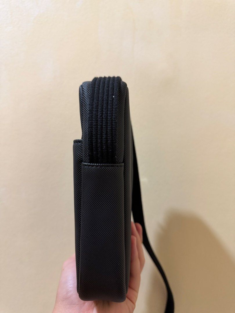 Lacoste Sling Bag (Category: Sling Bags) located in Makati City. Submitted by rfstn (Listing ID 1467801409, Image 3). Description: - Original - Used thrice in mall - No issue.
