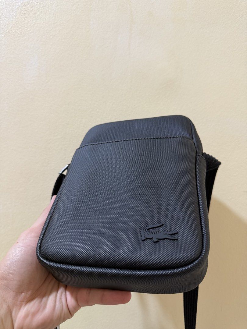 Lacoste Sling Bag (Category: Sling Bags) located in Makati City. Submitted by rfstn (Listing ID 1467801409, Image 2). Description: - Original - Used thrice in mall - No issue.