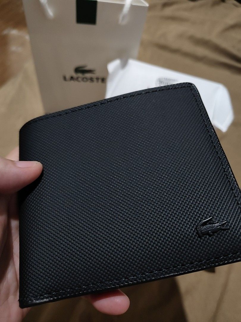 Lacoste wallet (Category: Wallets & Card Holders) located in Manila. Submitted by danicacruz1024 (Listing ID 1467637592, Image 1). Description: 100% original complete with box and paperbag.