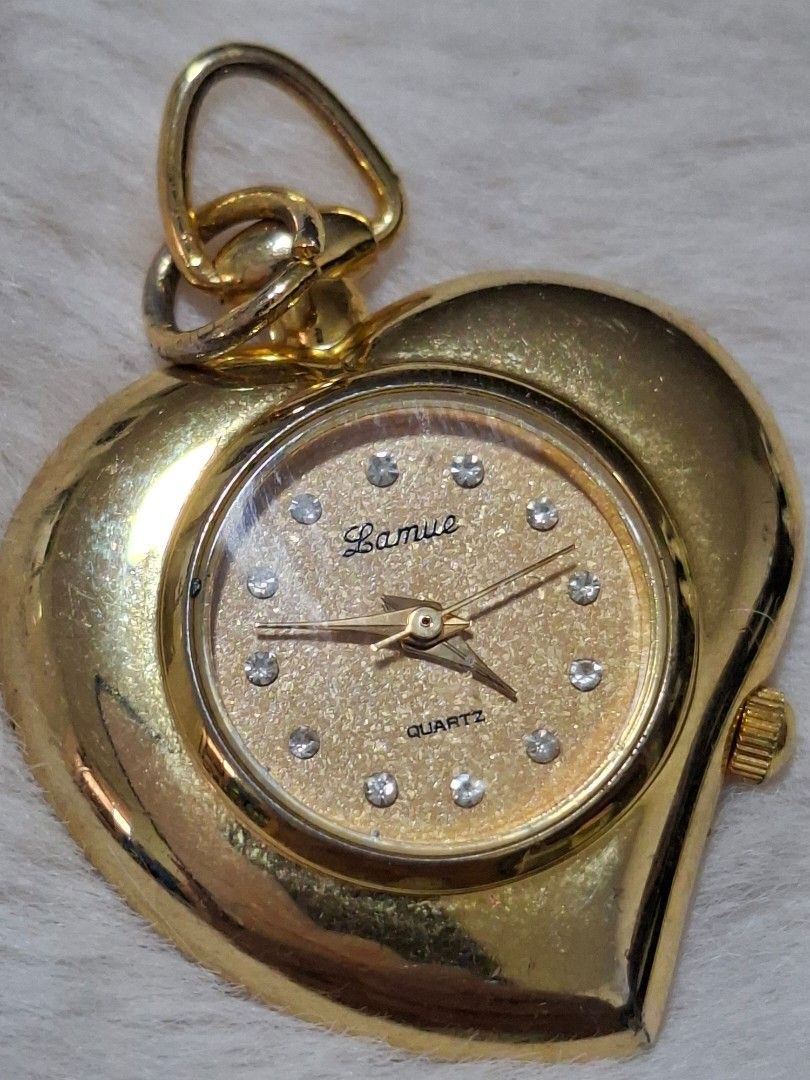 LAMUE BY J-AXIS HEART PENDANT WATCH (Category: Accessory Holder, Box & Organizers) located in Las Pinas. Submitted by annachiaonair2037 (Listing ID 1467689237, Image 1). Description: LAMUE BY J-AXIS HEART PENDANT WATCH FROM JAPAN WORKING CONDITION Disclaimer: I am not affiliated with, associated with, or authorized by any of the brands featured posted. Any mention of brand names, trademarks, or logos is solely for identification and reference pur
