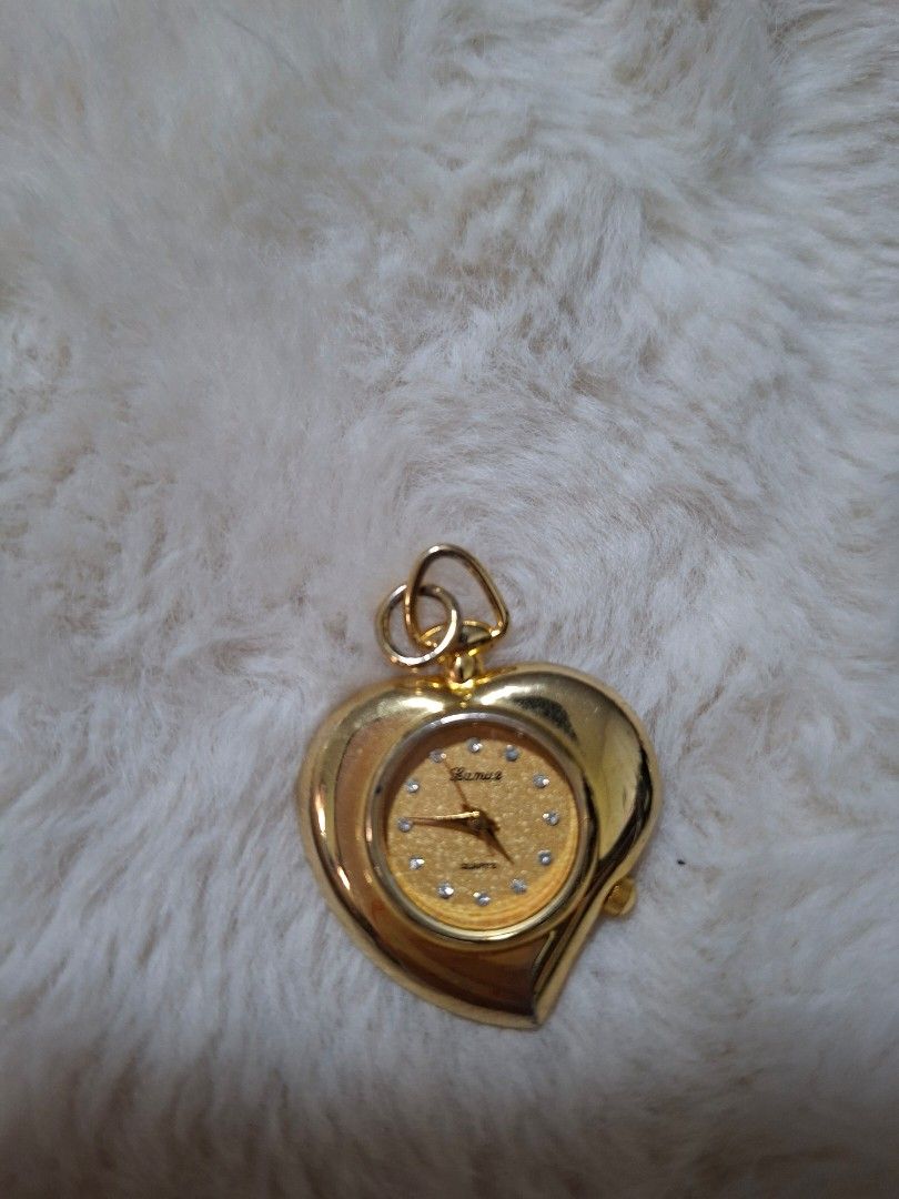 LAMUE BY J-AXIS HEART PENDANT WATCH (Category: Accessory Holder, Box & Organizers) located in Las Pinas. Submitted by annachiaonair2037 (Listing ID 1467689237, Image 2). Description: LAMUE BY J-AXIS HEART PENDANT WATCH FROM JAPAN WORKING CONDITION Disclaimer: I am not affiliated with, associated with, or authorized by any of the brands featured posted. Any mention of brand names, trademarks, or logos is solely for identification and reference pur