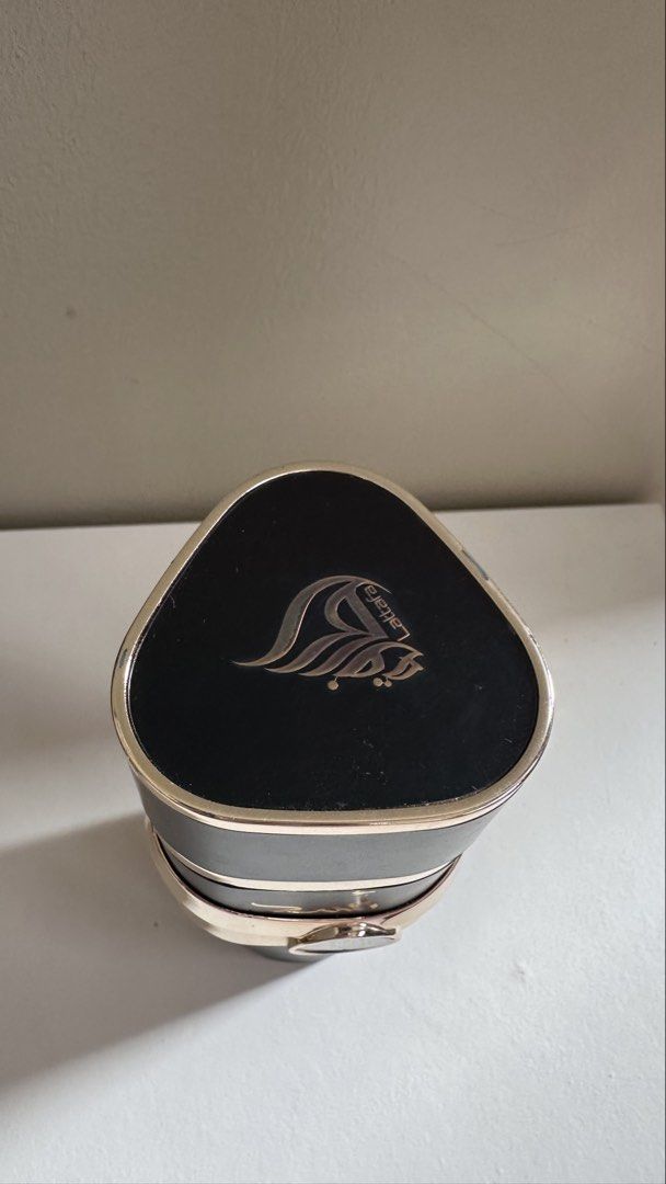 Lattafa Asad Eau De Parfum (Category: Fragrance & Deodorants) located in Antipolo. Submitted by waco1313 (Listing ID 1467646420, Image 2). Description: Brand & Name: Lattafa – Asad (Eau de Parfum) Concentration: Eau de Parfum (EDP) Natural Spray Volume: 100 mL / 3.4 FL. OZ. Origin: Made in U.A.E. Bottle Features: Sculpted matte black container with metallic gold bands, a center crest featuring a lion emblem, bold Arabic typography (أسد / Asad mea