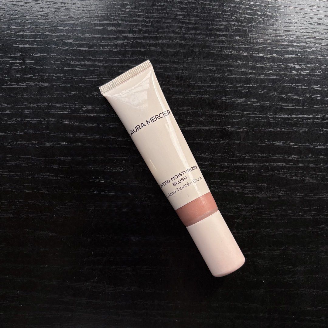 Laura Mercier Tinted Moisturizer Blush (Category: Makeup) located in Manila. Submitted by ellieaux (Listing ID 1467778522, Image 1). Description: - Authentic Laura Mercier Tinted Moisturizer Blush - Standard size squeeze tube for easy, mess-free application - Lightweight formula with a hydrating finish - Gives cheeks a natural, healthy flush of color - Travel-friendly, perfect for daily makeup bags.