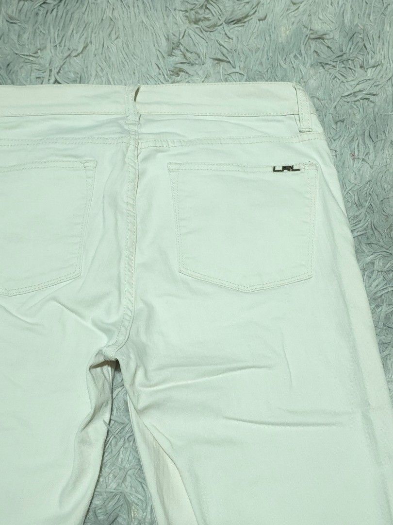 Lauren Jeans Co. White Denim Pants (Category: Jeans) located in Abulug. Submitted by humanwhosellthings (Listing ID 1467641863, Image 3). Description: - Brand: Lauren Jeans Co. Womens Denim Pants ✅Excellent Condition ✅Issue: needs wash only ▫️Waist Size: 30-32 ▫️Length: 40 - Color: Classic white - Cut: Straight leg - Details: 5-pocket styling, metal rivets, button closure, and signature LRL metal logo plaque on the back pocket - Styling: Versatil