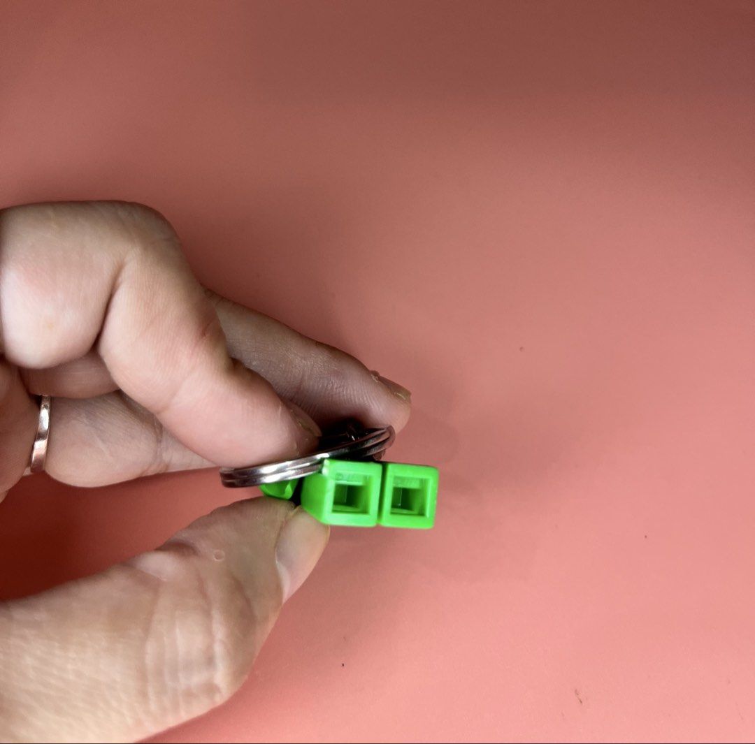 LEGO Hulk Minifigure Keychain Marvel Avengers (Category: Character Goods) located in Caloocan City. Submitted by snapshop_ph (Listing ID 1467644500, Image 3). Description: - Authentic LEGO Hulk minifigure keychain - Features iconic green skin, purple pants, and angry facial expression - Attached to a sturdy metal split ring via a short chain - Standard LEGO stud holes visible on the back of the legs - Clean metal hardware with minimal wear - Perf