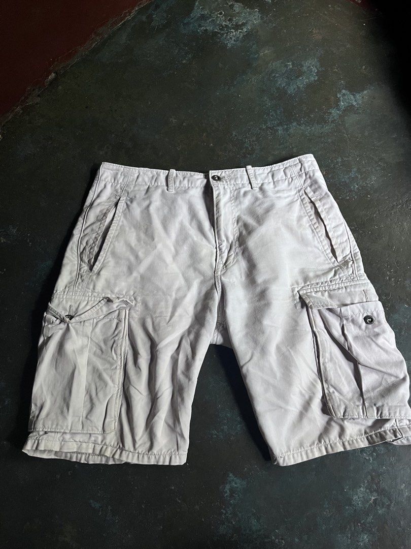 Levi Strauss & Co. Off-White Cargo Shorts (Category: Shorts) located in Manila. Submitted by coybns (Listing ID 1467626914, Image 1). Description: - Brand: Levi Strauss & Co. - Color: Off-white / Light beige - Style: Classic utilitarian cargo shorts - Pockets: Dual side cargo pockets with button closures - Material: Sturdy, breathable cotton (great for warm weather) - Features: Belt loops, zip fly, clean waistband, and iconic Levi's leather-style