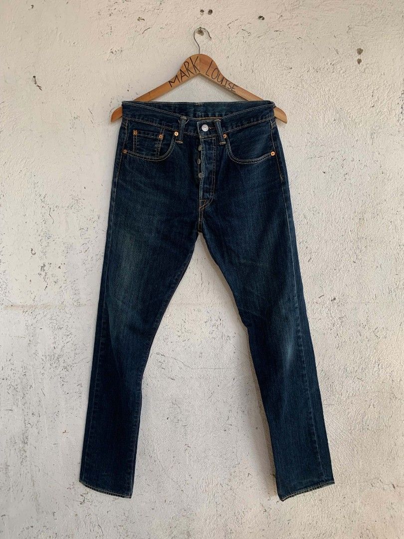 Levi's 501 CT Jeans (Category: Jeans) located in Manila. Submitted by louiseluch69680 (Listing ID 1467645633, Image 2). Description: - Brand/Model: Levi's 501 CT Denim Jeans - Wash: Dark Blue - Size: W29 L32 - actual dimension: waistline: 30 length: 42 thigh: 10 leg opening: 6.5 - Closure: Classic button fly with copper rivets - Details: Signature leather patch, rear red tab, and clean chain-stitched hem - Condition: Excellent, solid construction