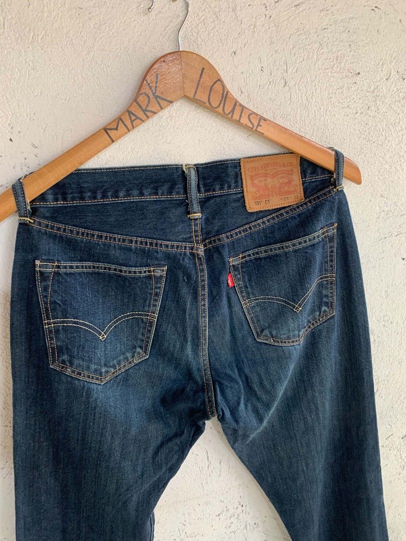 Levi's 501 CT Jeans (Category: Jeans) located in Manila. Submitted by louiseluch69680 (Listing ID 1467645633, Image 3). Description: - Brand/Model: Levi's 501 CT Denim Jeans - Wash: Dark Blue - Size: W29 L32 - actual dimension: waistline: 30 length: 42 thigh: 10 leg opening: 6.5 - Closure: Classic button fly with copper rivets - Details: Signature leather patch, rear red tab, and clean chain-stitched hem - Condition: Excellent, solid construction