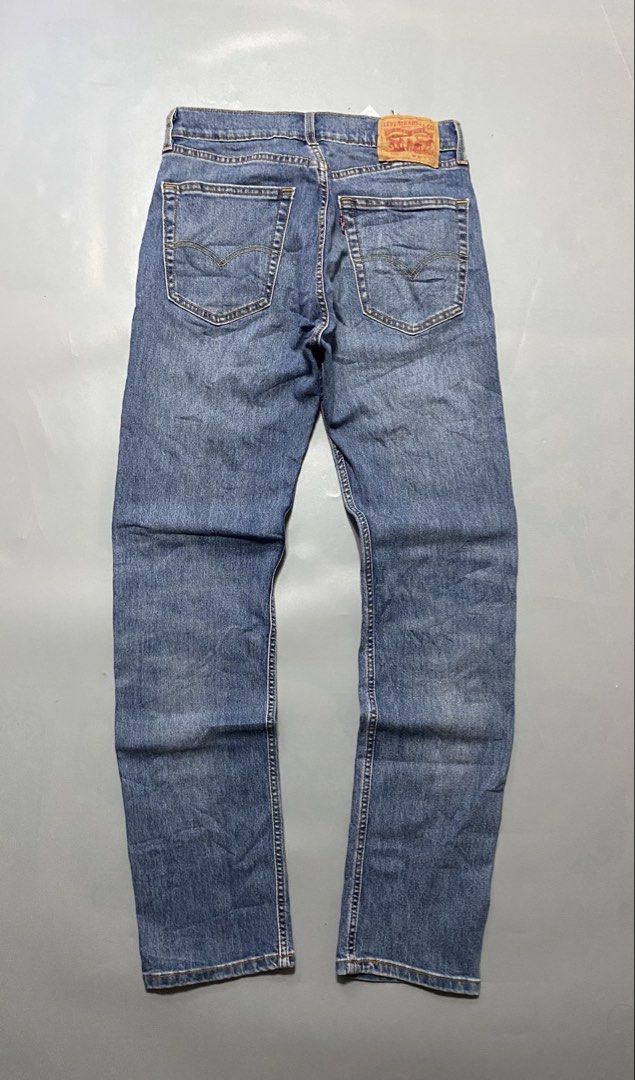 Levi's 505 Regular Fit Jeans W30 L32 (Category: Jeans) located in Manila. Submitted by delunakenn94368 (Listing ID 1467757227, Image 2). Description: - Brand: Levi's 505 - Style: Straight leg, mid-rise waist - Color: Medium blue wash - Size: W30 L32 (leather patch and internal tags intact) - Details: Traditional 5-pocket setup, back pocket arcs, and red tab - Condition: Clean denim with minimal visible wear.