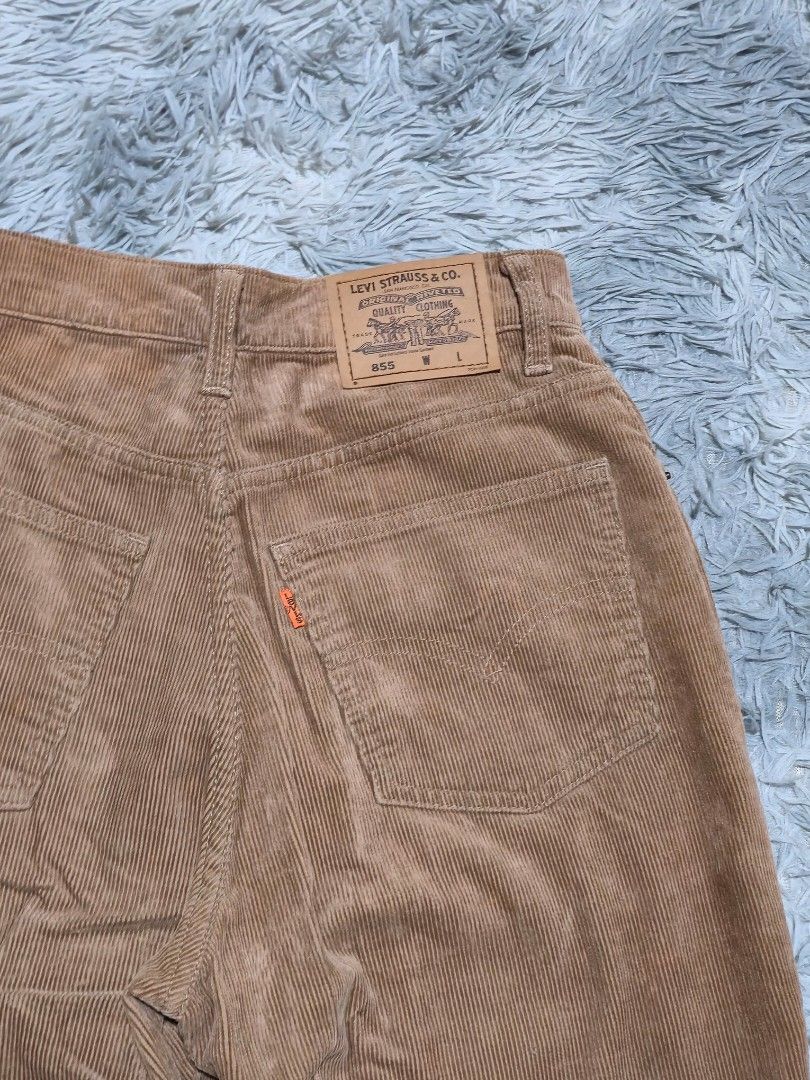 Levi's 855 Corduroy Pants Brown (Category: Jeans) located in Abulug. Submitted by humanwhosellthings (Listing ID 1467644923, Image 3). Description: - Brand/Model: Levi's 855 Corduroy Trousers ✅Excellent Condition ✅Issue: none ▫️Waist Size: 25 ▫️Length: 40 - Color: Warm Brown - Style: Classic five-pocket setup with belt loops and standard button closure - Details: Signature leather patch on the back waistband and iconic orange tab on the rear pock