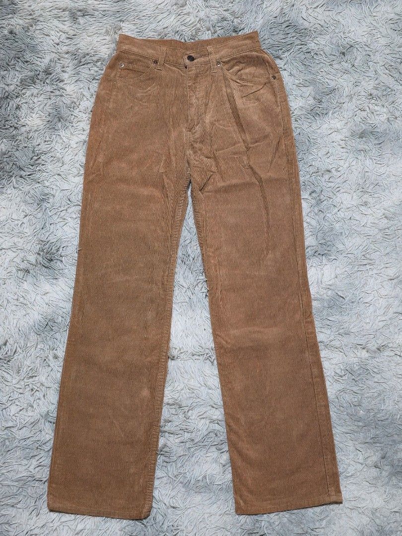 Levi's 855 Corduroy Pants Brown (Category: Jeans) located in Abulug. Submitted by humanwhosellthings (Listing ID 1467644923, Image 2). Description: - Brand/Model: Levi's 855 Corduroy Trousers ✅Excellent Condition ✅Issue: none ▫️Waist Size: 25 ▫️Length: 40 - Color: Warm Brown - Style: Classic five-pocket setup with belt loops and standard button closure - Details: Signature leather patch on the back waistband and iconic orange tab on the rear pock