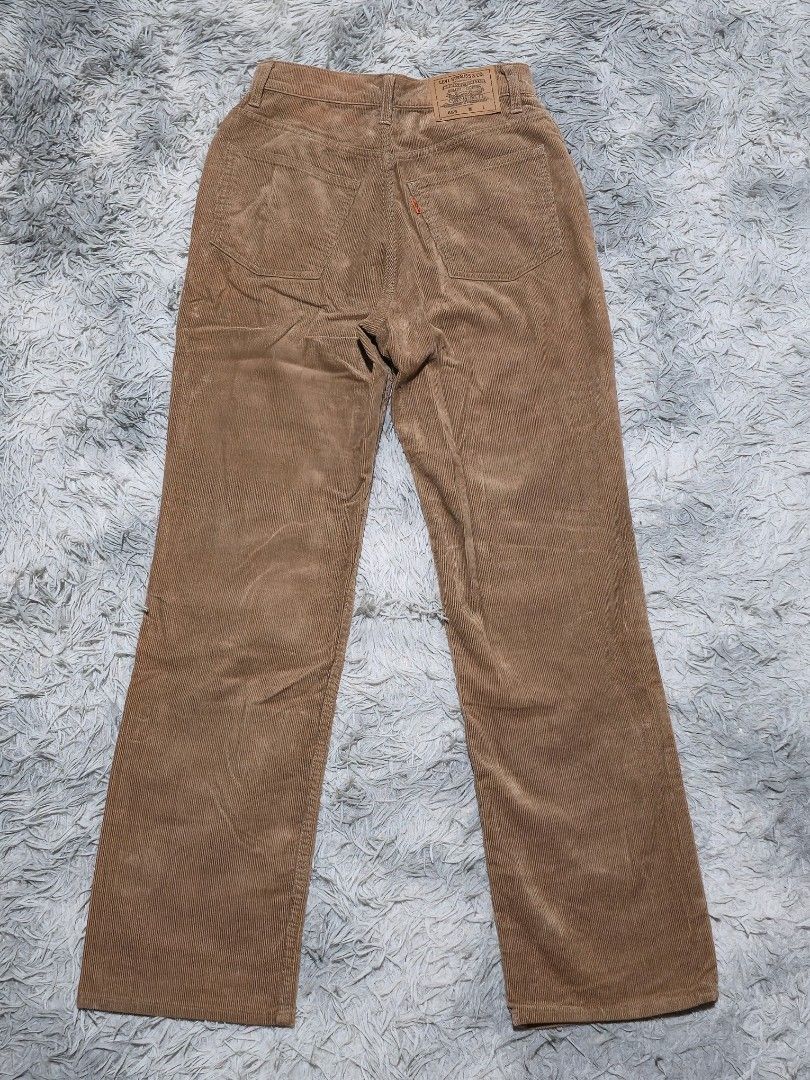 Levi's 855 Corduroy Pants Brown (Category: Jeans) located in Abulug. Submitted by humanwhosellthings (Listing ID 1467644923, Image 1). Description: - Brand/Model: Levi's 855 Corduroy Trousers ✅Excellent Condition ✅Issue: none ▫️Waist Size: 25 ▫️Length: 40 - Color: Warm Brown - Style: Classic five-pocket setup with belt loops and standard button closure - Details: Signature leather patch on the back waistband and iconic orange tab on the rear pock