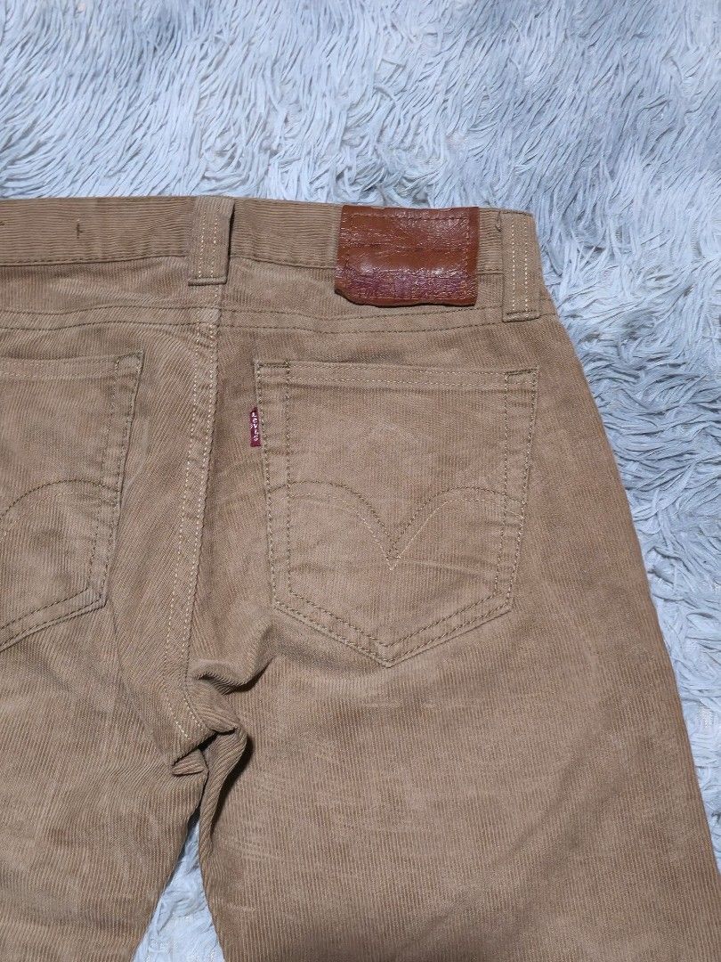 Levi's Corduroy Pants Brown (Category: Jeans) located in Abulug. Submitted by humanwhosellthings (Listing ID 1467644598, Image 3). Description: LEVIS Corduroy Pants ✅Excellent Condition ✅Issue: none ▫️Waist Size: 29 ▫️Length: 43 - Design: Classic five-pocket style, button closure, belt loops - Details: Soft ribbed fabric texture, iconic red tab on back pocket, and brown leather waistband patch.