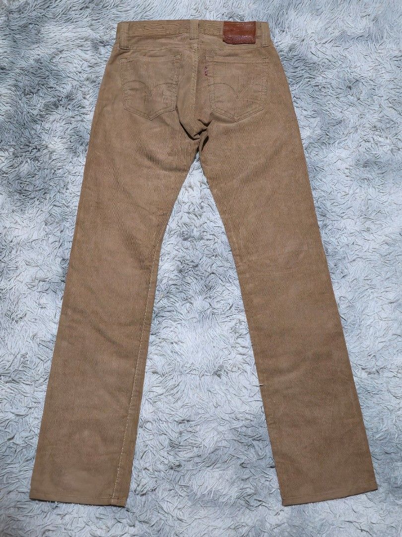 Levi's Corduroy Pants Brown (Category: Jeans) located in Abulug. Submitted by humanwhosellthings (Listing ID 1467644598, Image 1). Description: LEVIS Corduroy Pants ✅Excellent Condition ✅Issue: none ▫️Waist Size: 29 ▫️Length: 43 - Design: Classic five-pocket style, button closure, belt loops - Details: Soft ribbed fabric texture, iconic red tab on back pocket, and brown leather waistband patch.