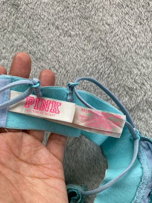 Light Blue Bralette (Category: Undergarments & Loungewear) located in Rizal. Submitted by sheeraay (Listing ID 1467653077, Image 3). Description: - Brand: PINK by Victoria's Secret - Color: Light Blue - Size: XS - Features: Adjustable straps, back hook closure, and a soft fabric band.