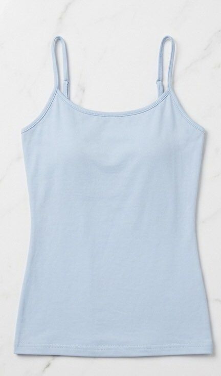 Light Blue Cami Top (Category: Sleeveless) located in Makati City. Submitted by bright.atiz0104 (Listing ID 1467646491, Image 1). Description: - Color: Light blue - Adjustable thin shoulder straps for a custom fit - Scoop neckline with a flattering fitted silhouette - Length: Hits above at the hip - Fabric: Soft, stretchy cotton - Styling: Great for layering or wearing on its own with shorts.