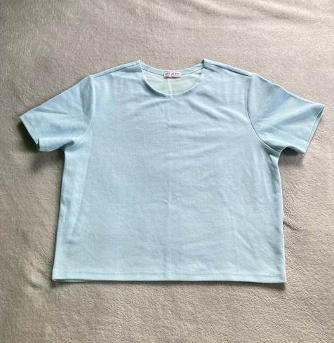 Light Blue Ribbed Shirt (Category: Shirts) located in Rizal. Submitted by sheeraay (Listing ID 1467666770, Image 2). Description: - Brand: Bny Jeans - Style: Light blue ribbed top with round neckline and short sleeves - Size: Large - Material: Stretchy, comfortable fabric - Perfect for effortless, everyday casual wear.