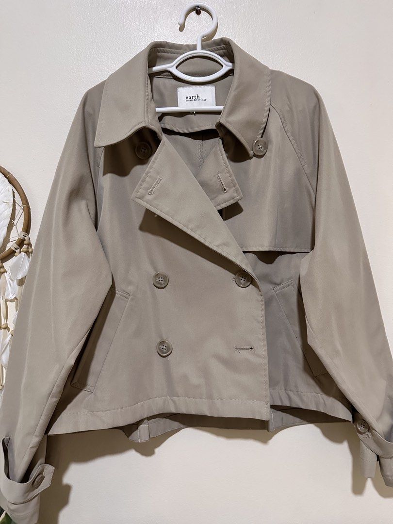 Light Brown Double Breasted Trench Coat (Category: Coats, Jackets and Outerwear) located in Manila. Submitted by eltums (Listing ID 1467697661, Image 2). Description: Lightly used trench coat Can be styled multiple ways Adjustable sleeves Bought this from Japan Best fits L to XL .