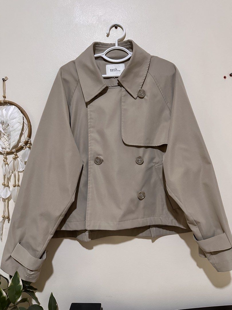 Light Brown Double Breasted Trench Coat (Category: Coats, Jackets and Outerwear) located in Manila. Submitted by eltums (Listing ID 1467697661, Image 1). Description: Lightly used trench coat Can be styled multiple ways Adjustable sleeves Bought this from Japan Best fits L to XL .