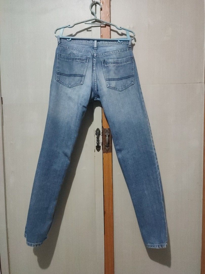 Light wash denim jeans pants medium blue (Category: Jeans) located in Manila. Submitted by jakelauren63238 (Listing ID 1467646168, Image 2). Description: - Color/Wash: Medium blue with light wash fading - Fit: Straight cut legs - Details: Classic five-pocket styling, zip fly, button closure, and simple back pocket stitching - Condition: Clean with minimal signs of wear - Style: Great everyday casual pants.