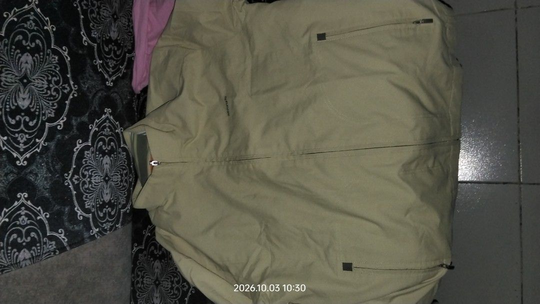 Light yellow zip-up casual jacket (Category: Coats, Jackets and Outerwear) located in Manila. Submitted by epicocean_bc6ede (Listing ID 1467831660, Image 1). Description: - Color: Light yellow - Closure: Full front zipper - Collar: Stand collar design - Pockets: Two zippered upper chest pockets and two zippered lower pockets near the hem - Material: Lightweight fabric in a clean, solid color - Style: Versatile everyday outerwear piece.