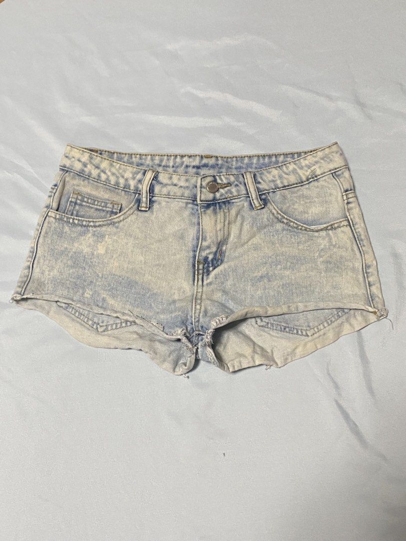 Lightwash Distressed Denim Shorts (Category: Shorts) located in Paranaque City. Submitted by pomeloluvr (Listing ID 1467685859, Image 1). Description: - Style: Casual lightwash denim shorts with an edgy acid wash finish - Details: Classic five-pocket design, sturdy belt loops, and a secure zip fly with top button closure - Hem: Trendy raw hem cutoffs - Versatility: Easy to style with basic tees or tanks for sunny days - Condition: Brand new and r