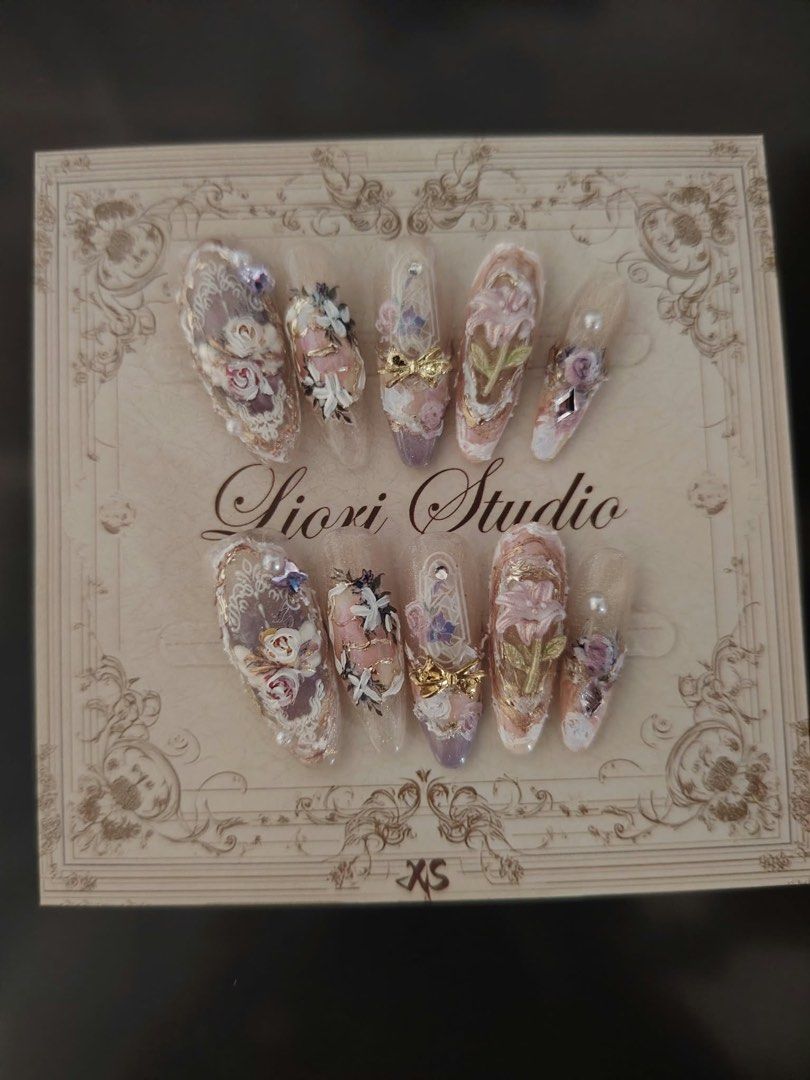 Liori Studio Floral 3D Handmade Press-On Nails (Category: Hands & Nails) located in Mandaluyong City. Submitted by yanapanana (Listing ID 1467754405, Image 1). Description: Shape: Long almond, 2.7 cm Size: XS (14mm thumb) Condition: Brand new! (never been worn) - Nail kit/sticker glue included MOP: Gcash MOD: J&T / Lalamove.