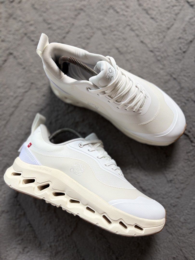 Loewe x On Cloudtilt Cloudtecphase White Sneakers Size US 8 (Category: Sneakers) located in Lapu Lapu. Submitted by jadegodine04736 (Listing ID 1467650341, Image 1). Description: - Brand: Loewe x On Collaboration - Style: Cloudtecphase sneakers - Color: All white with cream midsole accents - Size: US 8 / EU 41 / UK 7.5 - Condition: Worn a few times, clean uppers with minimal wear on outsoles - Details: Dual branding on heel pull tabs and side, li