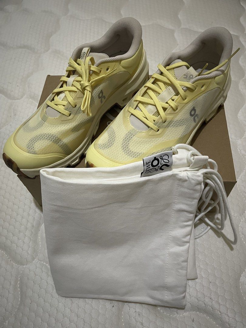Loewe x On Cloudventure 2.0 Yellow Tan Grey (Category: Sneakers) located in Caloocan City. Submitted by deocampoer61300 (Listing ID 1467725231, Image 2). Description: - Brand: Loewe x On Cloudventure 2.0 Trail Running Sneakers - Colorway: Yellow, Tan, and Grey - Size: EU 43 - Condition: Brand new, unworn, fresh out of the box - Inclusions: Original branded dust bag and shoebox - Perfect standout piece from the exclusive collection!.