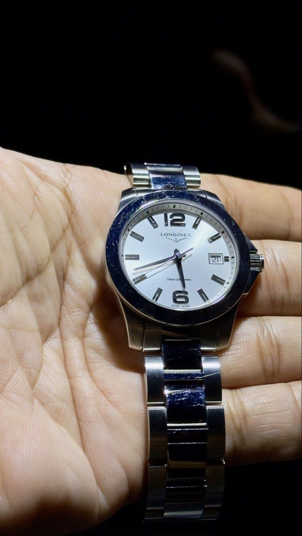 Longines Conquest Quartz movement (Category: Luxury Watches) located in Manila. Submitted by noblebird_a9271e (Listing ID 1467827835, Image 2). Description: location: Tondo Manila price: 25k condition: good, minor scratches on bezel and bracelet. complete with box warranty card. 34mm women size quartz from: lucerne-solaire.