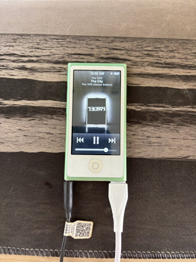 (Looking for repair) Apple iPod nano 7th Generation Green (Category: Portable Music Players) located in Makati City. Submitted by dennis_dumlao (Listing ID 1467620596, Image 2). Description: - Model: Apple iPod nano 7th Generation (Green) - Condition: Fully working, tested screen, UI, Lightning charging, and 3.5mm headphone jack - Features: Slim touchscreen design, physical home button, music player, FM radio, and Nike+ fitness tracking - Bonus: 