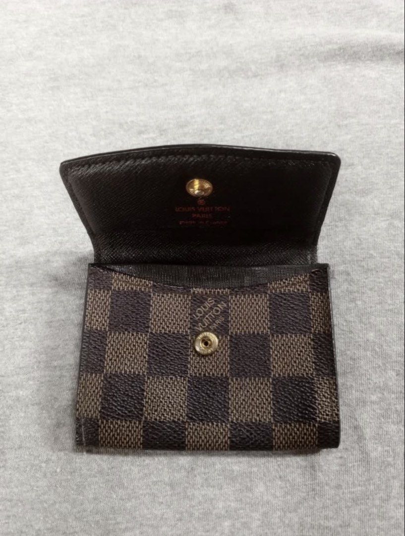 Louis Vuitton Damier Ebene Coin Purse Wallet (Category: Luxury Bags & Wallets) located in Lipa City. Submitted by lenmluxe (Listing ID 1467796313, Image 3). Description: - Iconic Damier Ebene brown checkered canvas - Secure gold-tone hardware snap closure - Compact design ideal for cards and loose change - Model number N61930 stamped in interior pocket - For Self Authentication please -Free Shipping #LvWallet #LvCardHolder #LouisVuitton #LVDamier