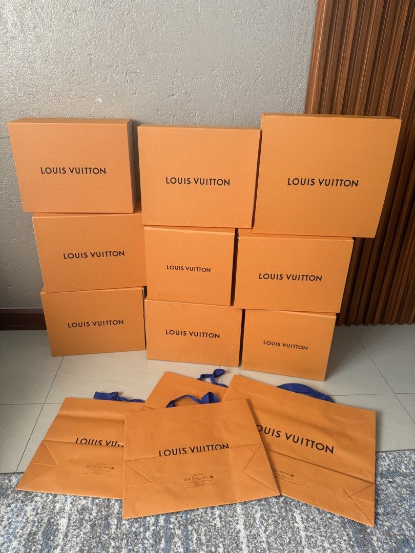 Louis Vuitton Empty Boxes and Paper Bags Bundle (Category: Luxury Bags & Wallets) located in Manila. Submitted by lunacakes (Listing ID 1467658852, Image 1). Description: - 100% Authentic Louis Vuitton packaging materials - Bundle includes multiple rigid orange gift boxes and paper shopping bags with blue handles - Clean, flat bags and sturdy boxes stored with care - Ideal for gift wrapping, home storage, or boutique display setups - Selling ever