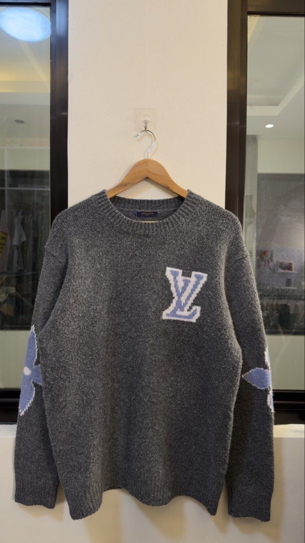 Louis Vuitton Monogram Crewneck Sweater Grey (Category: Coats, Jackets and Outerwear) located in Paranaque City. Submitted by mykapoynton (Listing ID 1467807941, Image 2). Description: Louis Vuitton Monogram Crewneck Sweater Grey - Trendy oversized fit with dark charcoal melange texture - Features a bold LV logo patch on the chest - Stylish blue monogram flower graphics on both sleeves - Classic crewneck with comfortable ribbed hems.