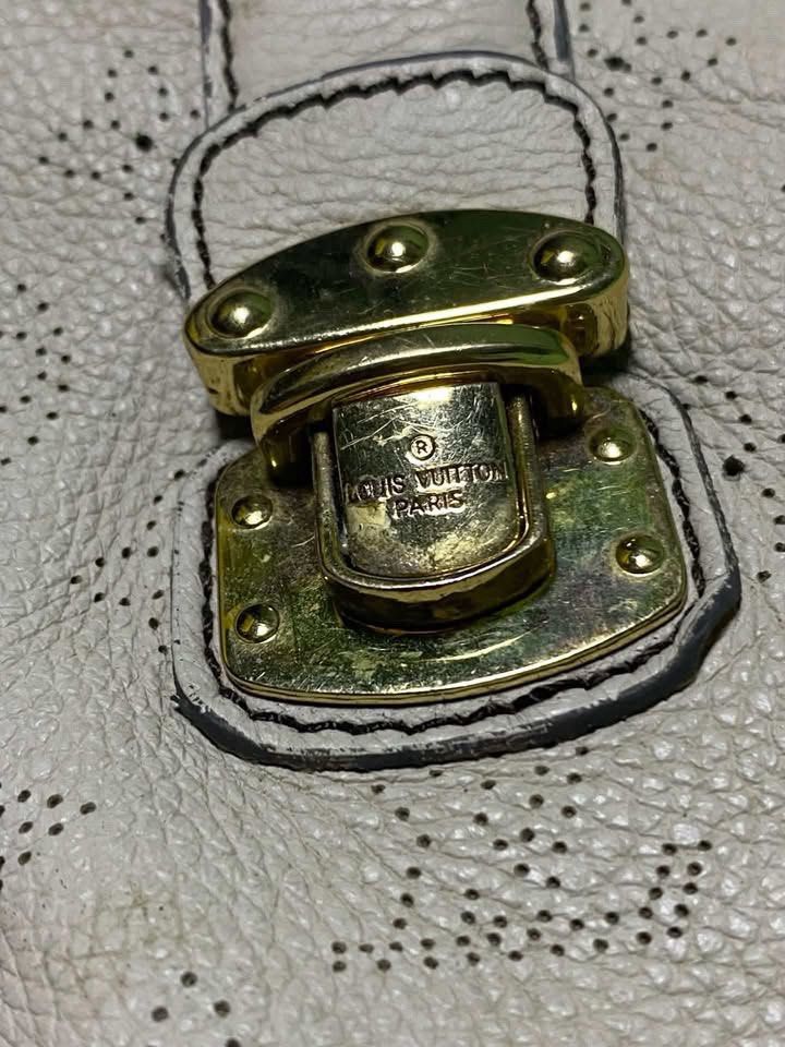 Louis Vuitton Monogram Mahina Leather Bag (Category: Luxury Bags & Wallets) located in Las Pinas. Submitted by wayne_heats (Listing ID 1467793655, Image 3). Description: measurement LENGTH: 19.5 WIDTH: 11.5 condition: good-excellent flaws | issues: need cleaning only.